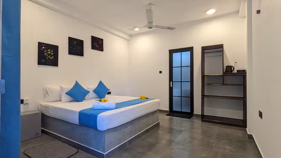 Mayon Beach Villa Blue bedroom wide view 2